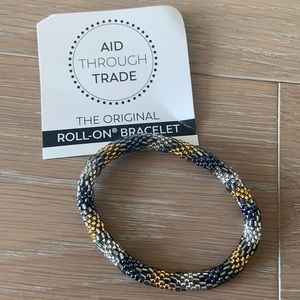 NWT - Aid Through Trade Roll-On Bracelet